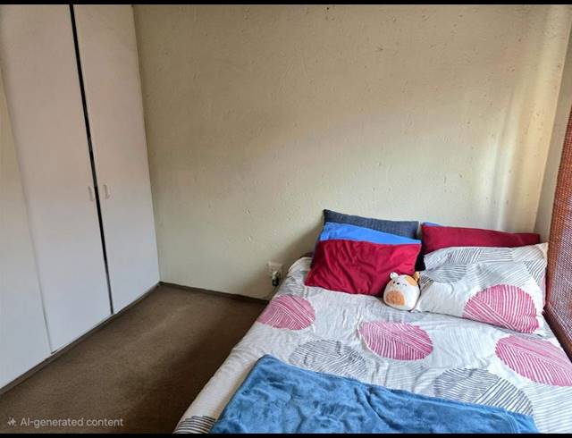 2 BEDROOM TOWNHOUSE FOR SALE IN ROOIHUISKRAAL NORTH